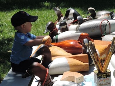 Little boy with decoys at St. Clement's Island Heritage Day Photo