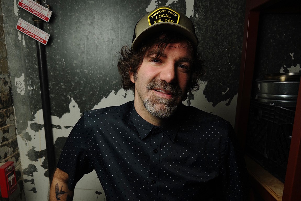 Stephen Kellogg wearing hat Photo