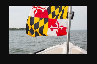 Boat with Maryland Flag Out on the Water Photo