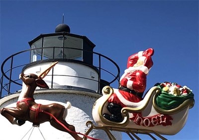 Piney Point Lighthouse Museum Holiday Santa in front of the Lighthouse Photo
