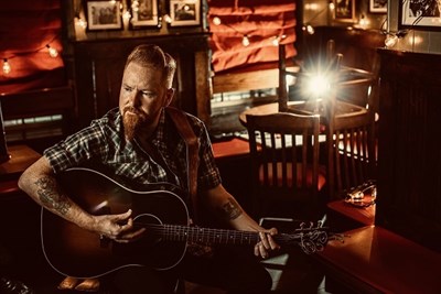 Danny Burns holding guitar Photo