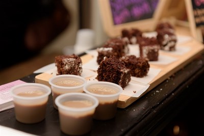Samples of chocolate cake on wooden board Photo
