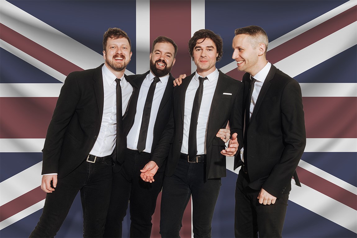 4 Men standing in front of British flag background Photo