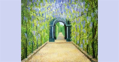 Path covered by leafy tunnel leading to arched garden doorway Photo
