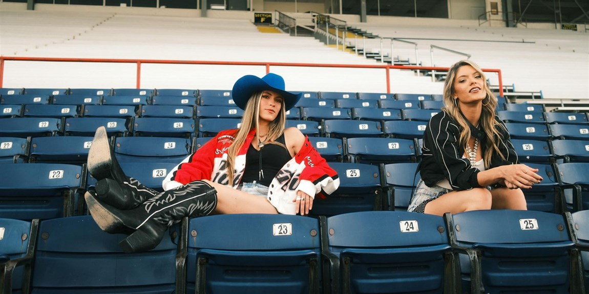 A dynamic sister duo blending modern country sound with pop energy and Southern charm. Photo