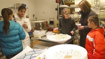 Group shot of the 2024 tour in Patti Hegland's studio Photo