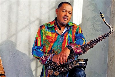 Najee holding saxophone Photo