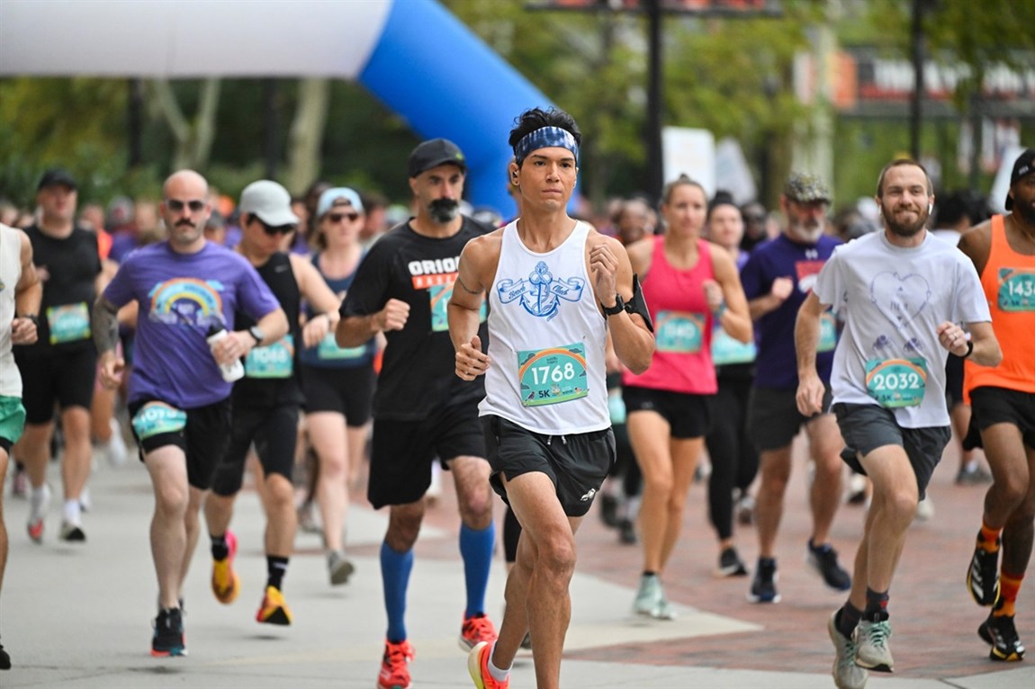 Runners taking part in the Family Fun Run at the Camden Yard Sports Complex Photo