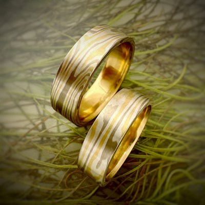 A pair of handcrafted mokume gane rings made at InBloom Jewelry. Photo