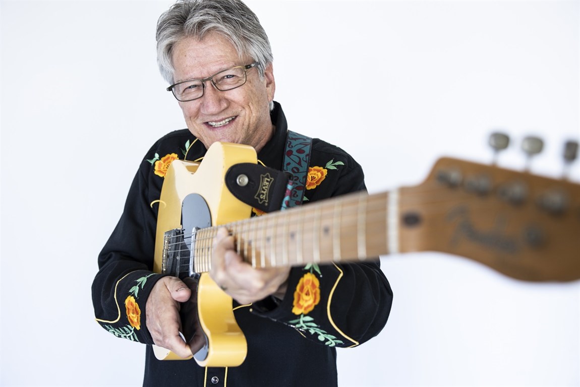 Richie Furay holding guitar Photo