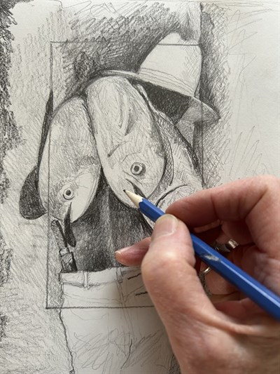 A hand draws a still life.  Photo