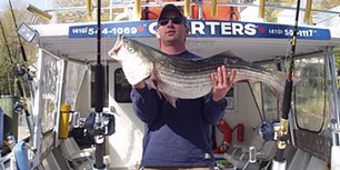 Kenneth Jeffries holding large fish aboard Charter Boat Photo