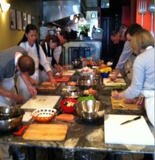 People cooking at Pierpoint Cooking Class. Photo