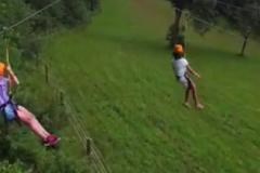 Zip lining at River Valley Ranch Photo