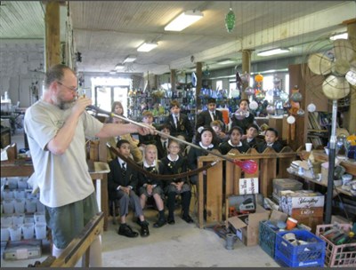 Man glass blowing Photo