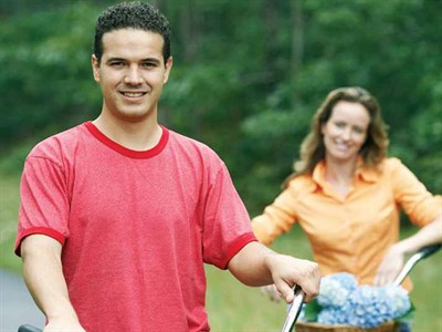 A couple riding bikes together Photo