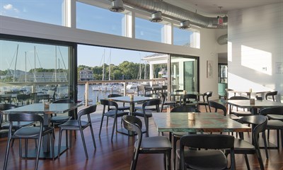 Interior view of waterfront dining room. Photo