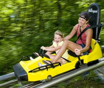 Woman and girl on Mountain Coaster at Wisp Photo