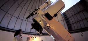 Scientist and Telescope Photo