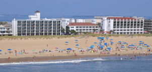 Beach view of the Castle In The Sand Hotel Photo