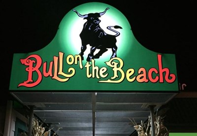 Bull on the Beach sign over the doors beckons diners Photo