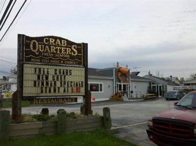 Sign outside of Crab Quarters. Photo