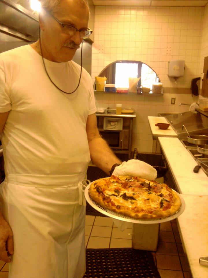 Pizza made at Osteria Alfredo Photo