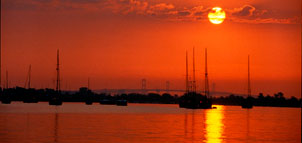 sunset on the water photo Photo