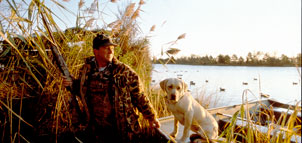 Hunter with yellow lab Photo