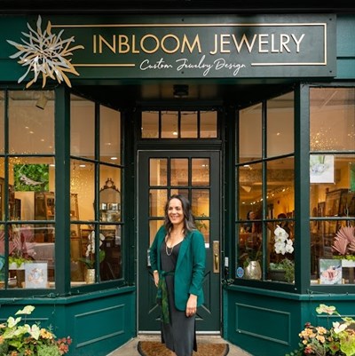 Founder Stacey Krantz at InBloom Jewelry's brick and mortar location on East Patrick Street. Photo