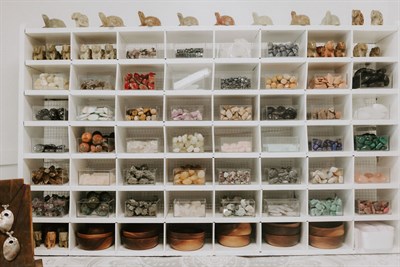 Crystals displayed on shelf Photo