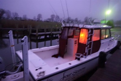 Four Seasons Guide Service fishing boat Photo