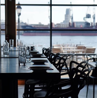 Waterfront view dining area at Ampersea Restaurant Photo