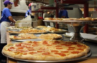 Pizza made with fresh dough daily. Photo