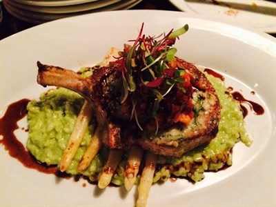 Steak over asparagus and rissoto Photo