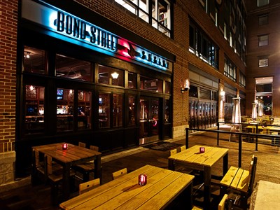 Bond Street Social Exterior at Night. Photo