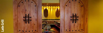 Doors opening to the Latin Grill Photo