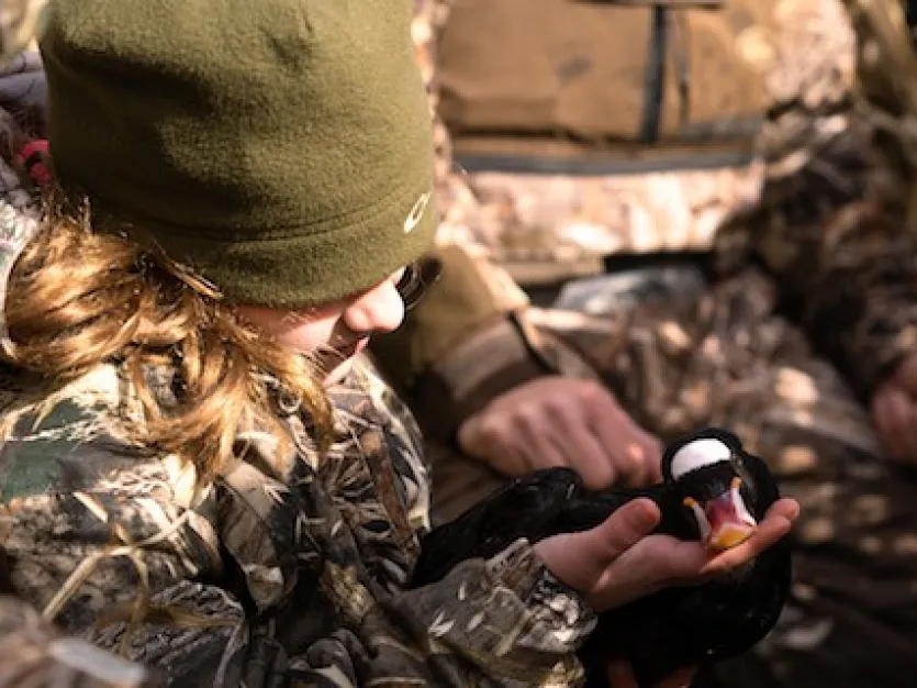 Hunter holding a waterfowl