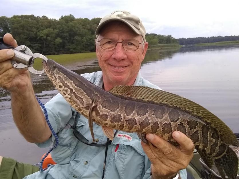 Tim with Snakehead-1.jpg