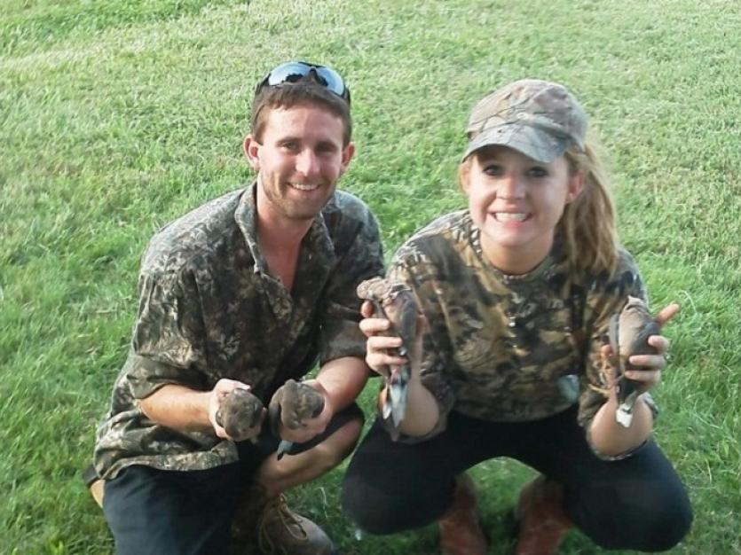 Two dove hunters in camouflage