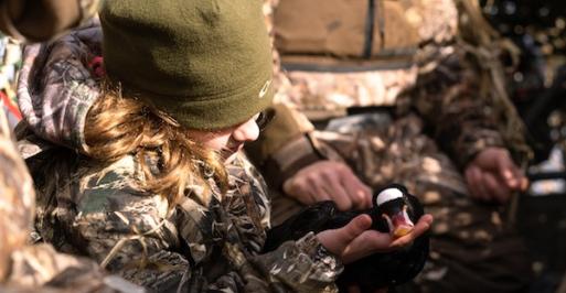 Hunter holding a waterfowl