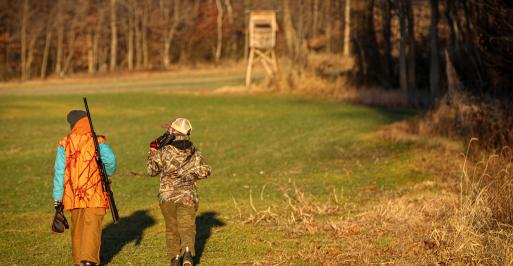 Two children practicing hunting