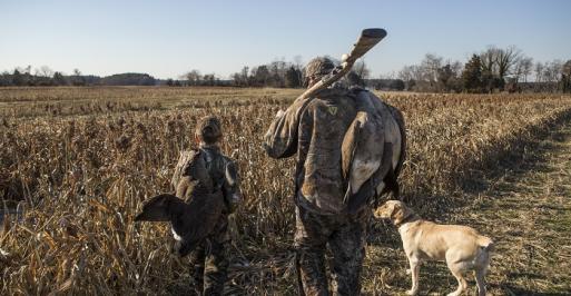 Father and son waterfowl hunting
