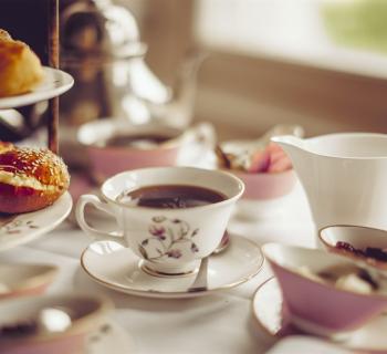 Table set for afternoon tea service. Photo