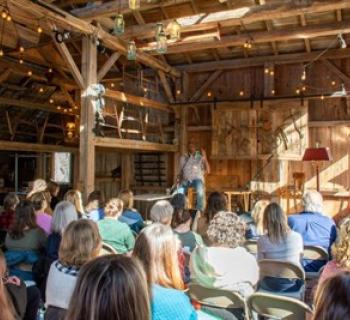 Keynote speaker at 2024 Writer's Retreat. Photo
