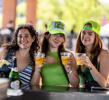 People are enjoying the pickle party! Photo