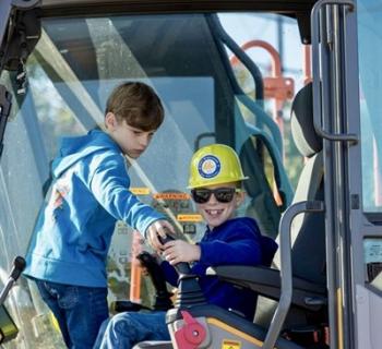 Children exploring equipment. Photo