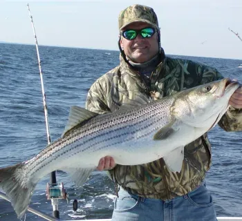 Man charter fishing Photo