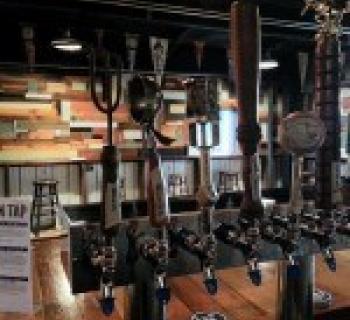 Beer taps at the bar of Waverly Brewing Company Photo