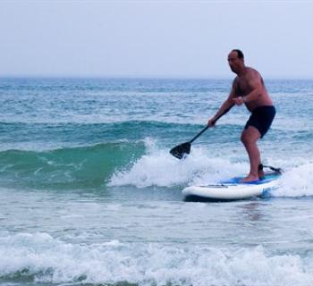 Stand up paddleboarding Photo